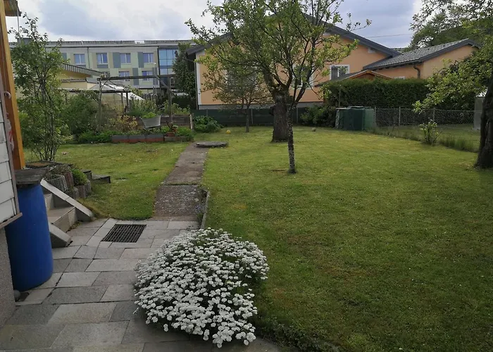 Apartamento Doppelhaushaelfte Mit Garten