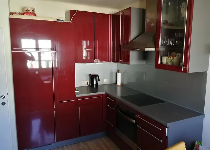 Apartamento Doppelhaushaelfte Mit Garten