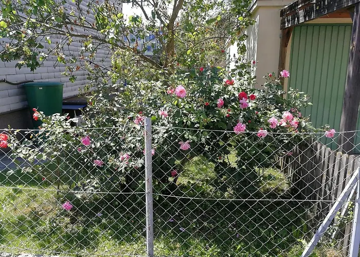 Apartamento Doppelhaushaelfte Mit Garten